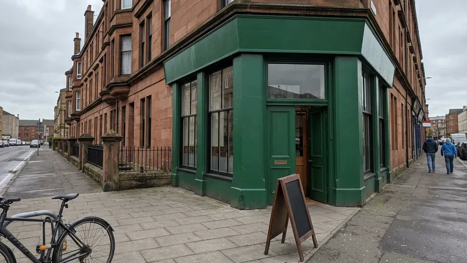 Albert Road Coffee, a corner café with a dark green shopfront in a red sandstone tenement