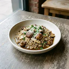 Barley and woodland mushrooms as it is plated at Bar Marta