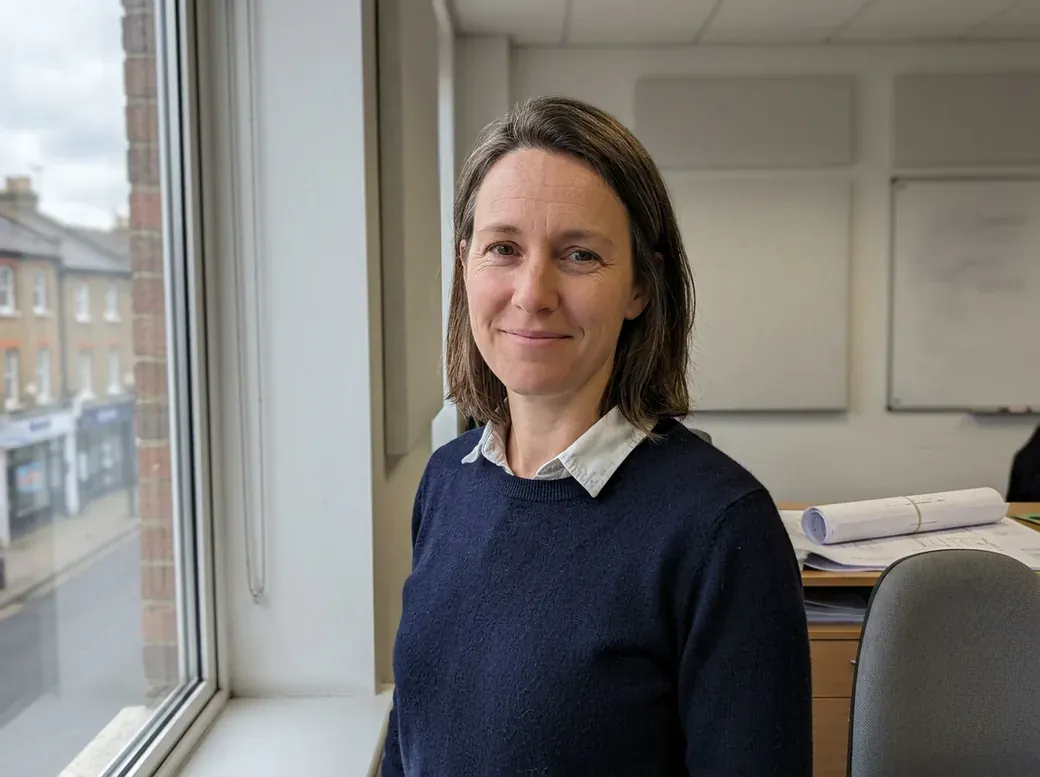 Elin Garside by a window in her office